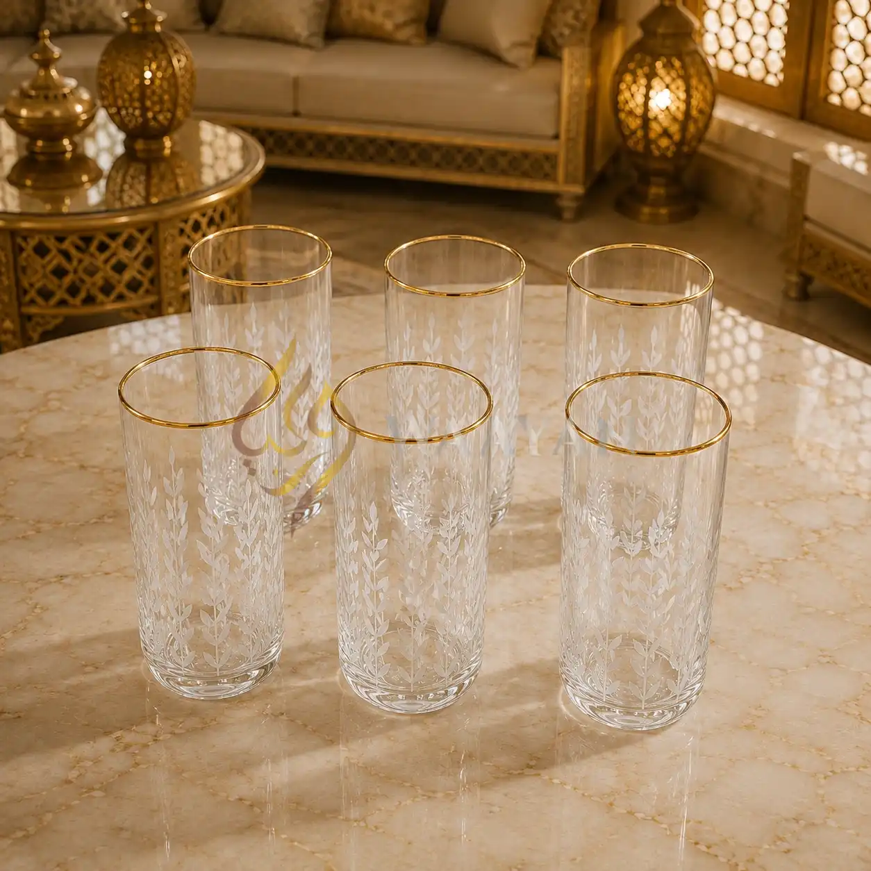 Set of six elegant glass tumblers with gold rim and delicate floral etching, perfect for any occasion.