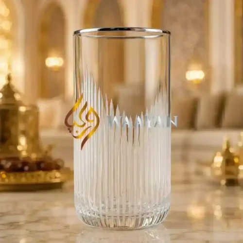 Elegant glass tumbler with a textured design, featuring a clear finish and subtle silver detailing. Perfect for any occasion.