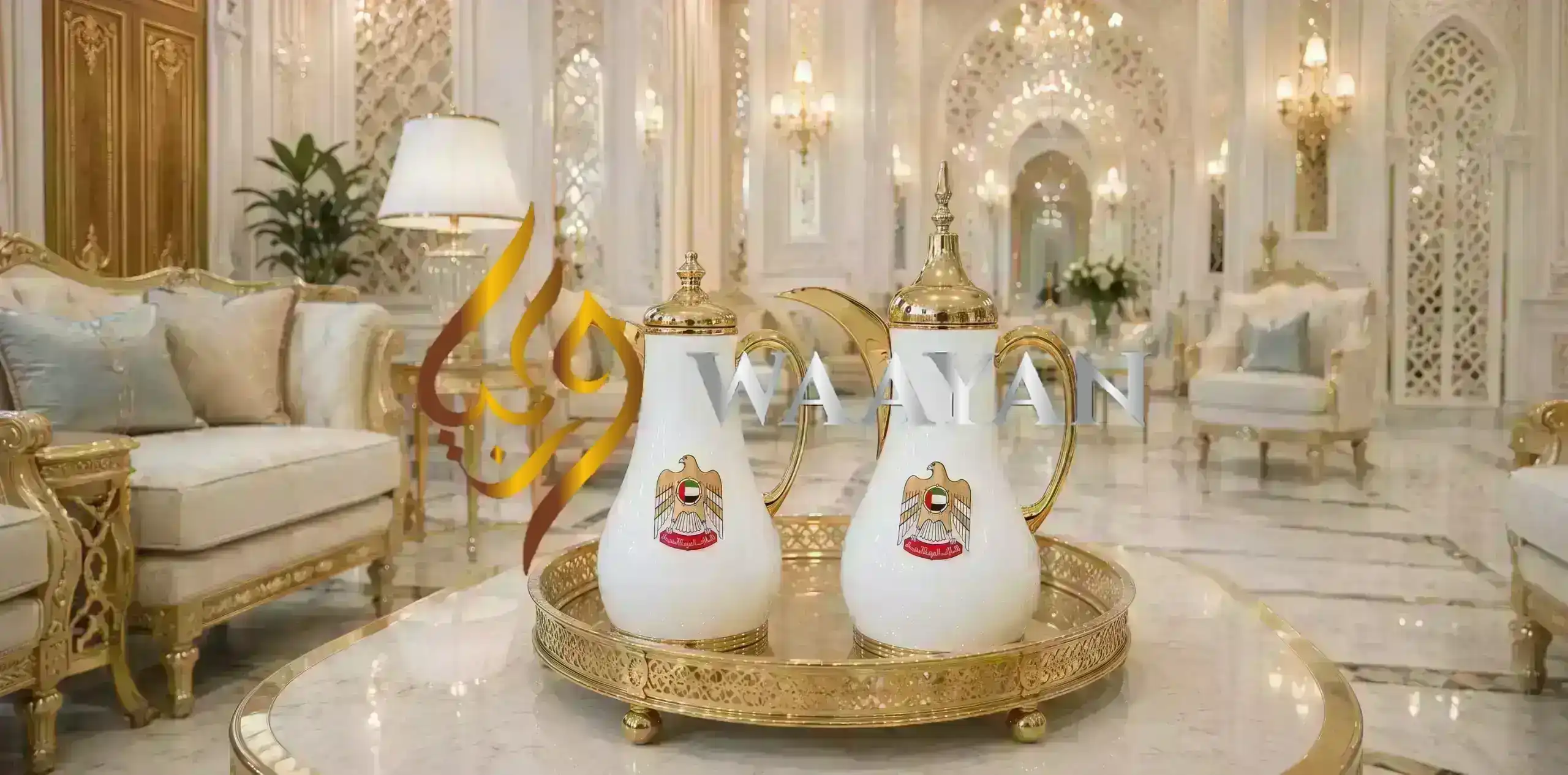 Set of two glossy white vacuum coffee flasks with gold lids, spouts and handles, UAE eagle crest