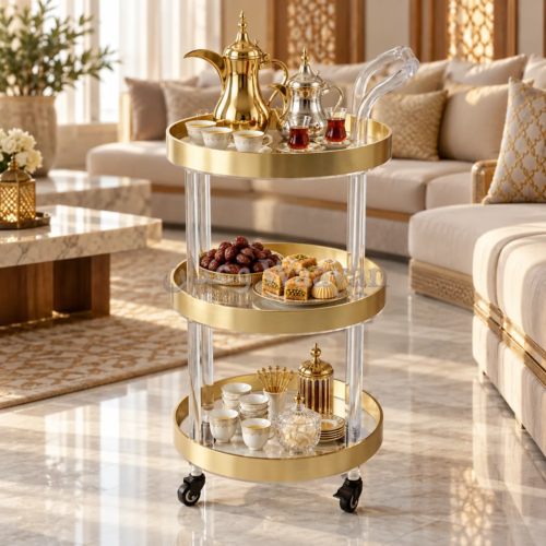 1000157955290_2 Three-tier serving trolley in brushed gold with clear acrylic supports, glass shelves, and black caster wheels