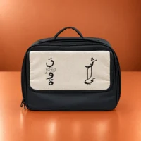 28982811-F0A7-46A7-AD93-2B7391D07F87 WAAYAN Black Flask Bag in jet black vegan leather with curved Arabic calligraphy canvas pocket
