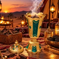 Golden Mabkhara at Desert Camp incense burner in gold-tone embossed metal with green enamel panels and a matching domed lid