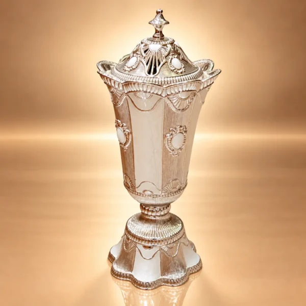 Ornate Silver Censer on Golden Glow WAAYAN Silver Incense Censer Luxury Arabian Homeware UAE