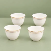 Cawa Cups, 12-Piece Set with Gold-Tone Rim Cawa cups in a 12-piece set, showing white cups with gold-tone rims