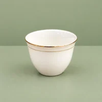 Cawa Cups, 12-Piece Set with Gold-Tone Rim Single white cawa cup with a gold-tone rim and narrow decorative band