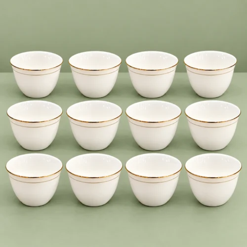 Cawa Cups, 12-Piece Set with Gold-Tone Rim Cawa cups in a 12-piece set, showing white cups with gold-tone rims