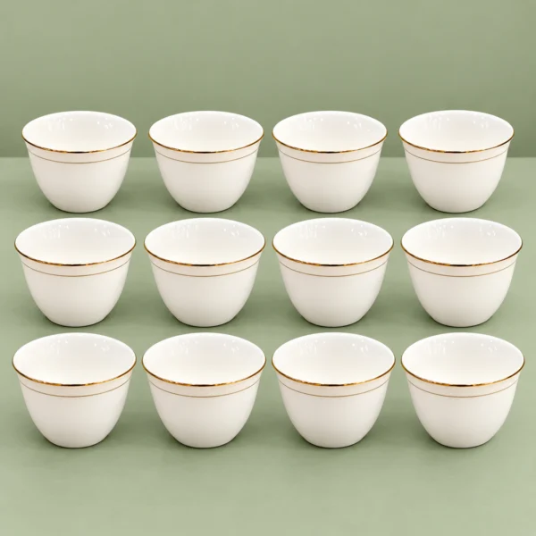 Cawa Cups, 12-Piece Set with Gold-Tone Rim Cawa cups in a 12-piece set, showing white cups with gold-tone rims